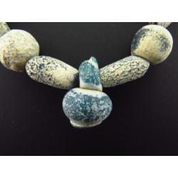 Egyptian necklace made of blue/green glass beads