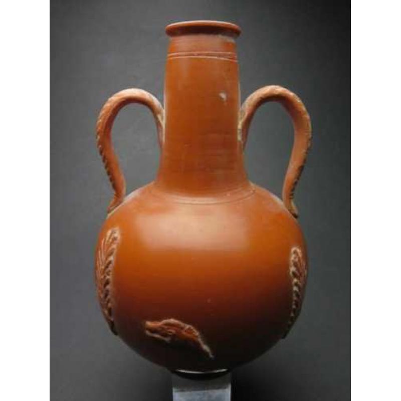 Roman Carthago sigilata bottle with boar and grain decoratio