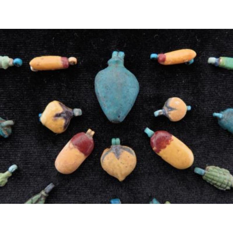 Collection of Egyptian faience Amarna flower and flower peta