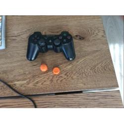 PS 3 inclusief controller en kontrolfreeks en 7 spellen