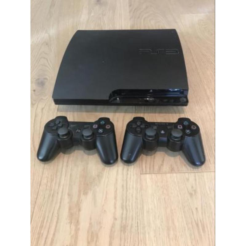 ps/playstation 3 met veel spellen en twee controllers