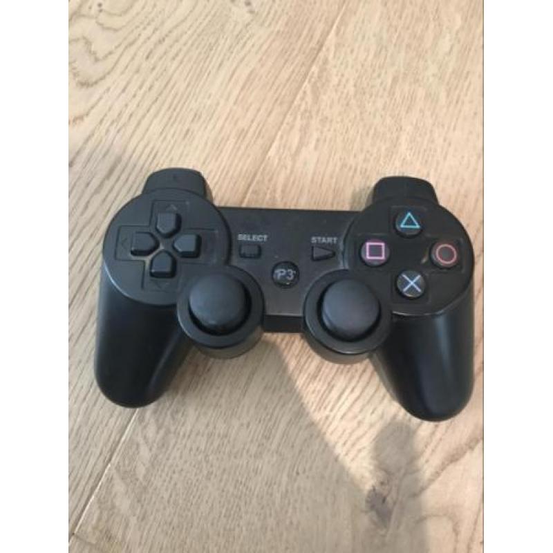 ps/playstation 3 met veel spellen en twee controllers